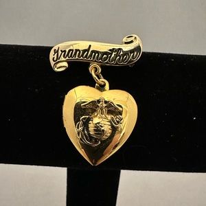 Grandmother gold tone heart locket brooch with USMC symbol